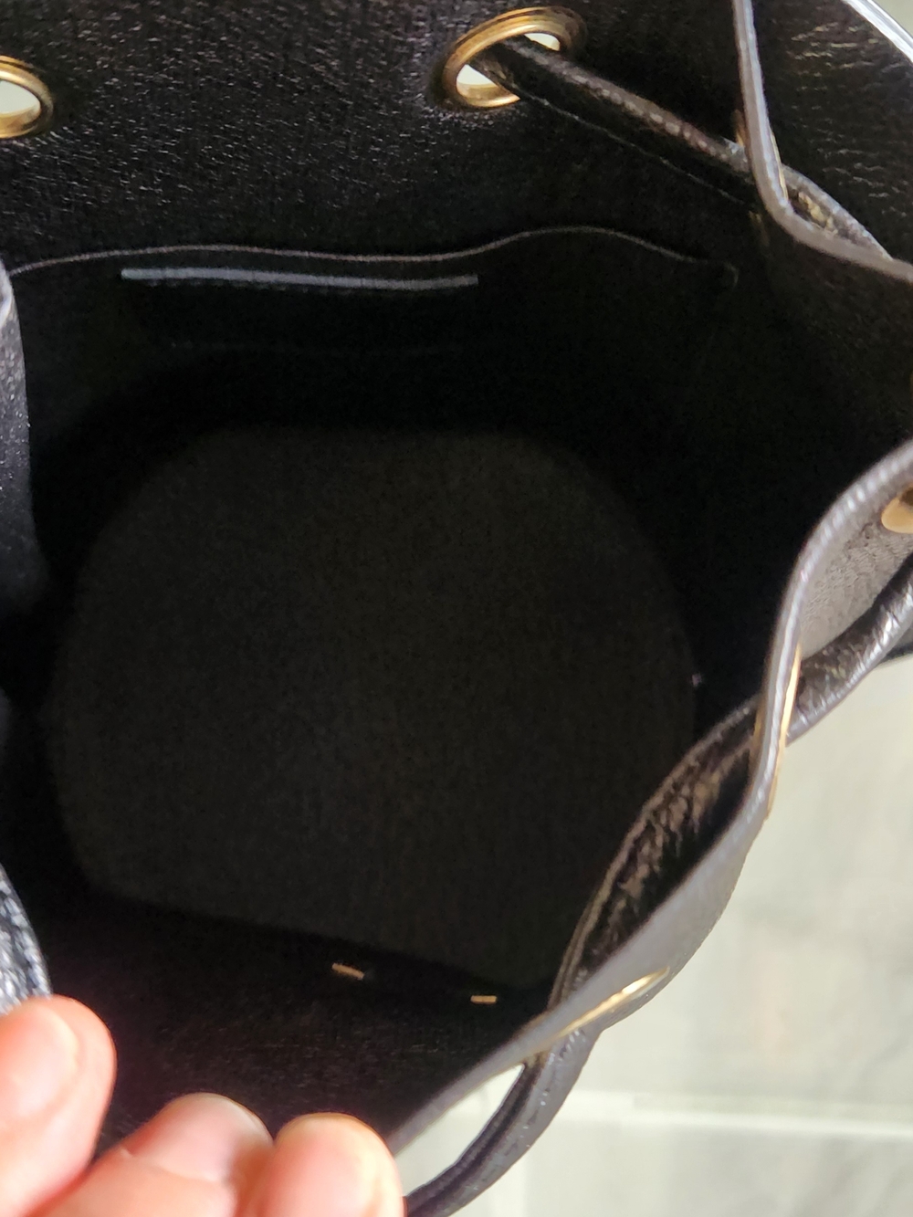 Black Leather Drawstring Bucket Bag with Chain Strap - Picture 9 of 10